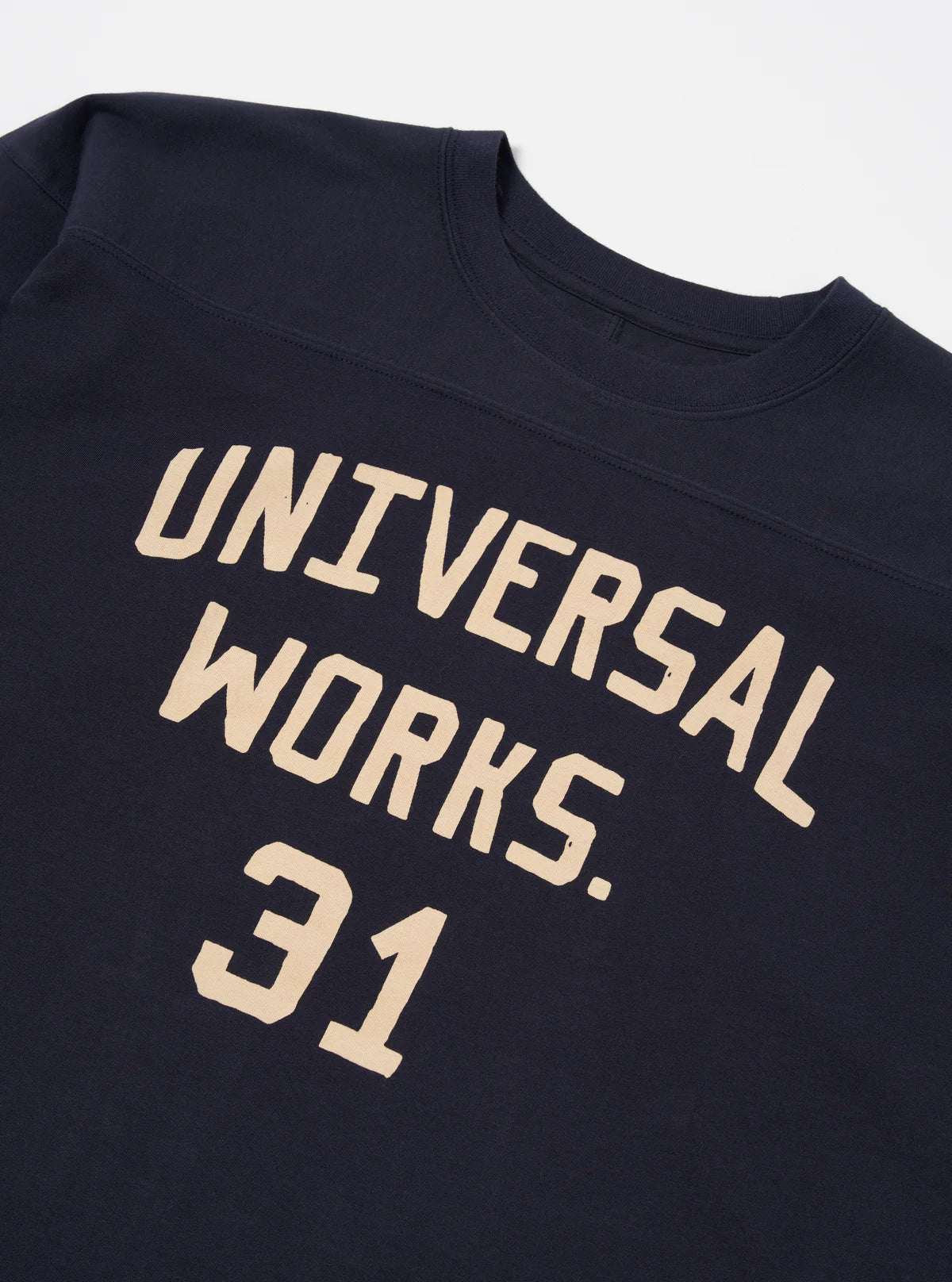 Universal Works Football T Shirt in Navy Single Jersey